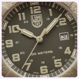 Close-up of the Luminox Watches Leatherback Sea Turtle Giant XS.0326 face at 10:10:34, featuring beige numbers, 100 METERS above 6 o’clock, date at 31, and reliable Swiss Made quartz movement—ideal for outdoor use.