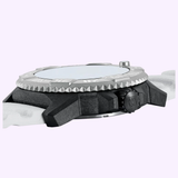 Side view of the Luminox Watches MIL-SPEC XL.3359.SET: a rugged military dive watch with a textured metallic bezel, black crown with logo, and white strap against a light purple background. Water resistant up to 300 meters.
