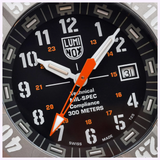 Close-up of a Luminox Watches MIL-SPEC XL.3359.SET at 10:08:36, showing bold white numerals, large white and orange hands, a date window at 31, and MIL-SPEC text highlighting its 300m water-resistant military dive design.