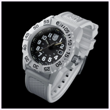 The Luminox Watches Navy SEAL 3500 XS.3507.WB features a black dial with white numerals, large bezel with minute markers, and a textured band, giving this Arctic Edition military dive watch a sporty and durable look.