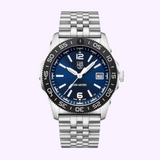 The Luminox Watches Pacific Diver Ripple XS.3123M.SET.1 features a blue face, silver hour markers, black bezel, and metal link band with self-powered illumination, date display, and 200m water resistance. UPC: 7611382654717.