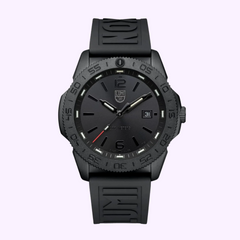 The Luminox Watches Pacific Diver XS.3121.BO.1 is a black sports wristwatch with a rubber strap, textured bezel, bold hour markers, self-powered illumination, date window at 3 o’clock, and the Luminox Watches logo below 12 o’clock.