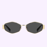 Gold-framed MARC JACOBS Sunglasses (MARC 496/SHI/US RHL GOLD BLACK) featuring geometric hexagonal dark lenses, are displayed against a soft lavender background. The modern design includes gradient lenses with the subtle MARC JACOBS branding on the upper right lens—an exquisite example of luxury eyewear from MARC JACOBS.