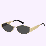 Featuring a striking gold frame and thick gold arms adorned with the MARC JACOBS logo, the MARC JACOBS Sunglasses MARC 496/SHI/US RHL GOLD BLACK boast black hexagonal lenses for a bold, modern look. Displayed on a light purple background, these luxury sunglasses by MARC JACOBS Sunglasses make an unmistakable style statement.