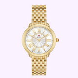 The MICHELE Watches SEREIN MID MWW21B000160 features a white dial with gold accents, Roman numeral markers, red crown, and logo below 12 o’clock. Brand: Michele Watches. UPC: 99945535944.