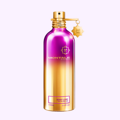 A metallic pink and gold Montale Perfumes bottle, MONTALE Beast Love EDP 3.4 Oz (100ml), unisex fragrance, features a gold neck tag and the label "MONTALE PARIS".