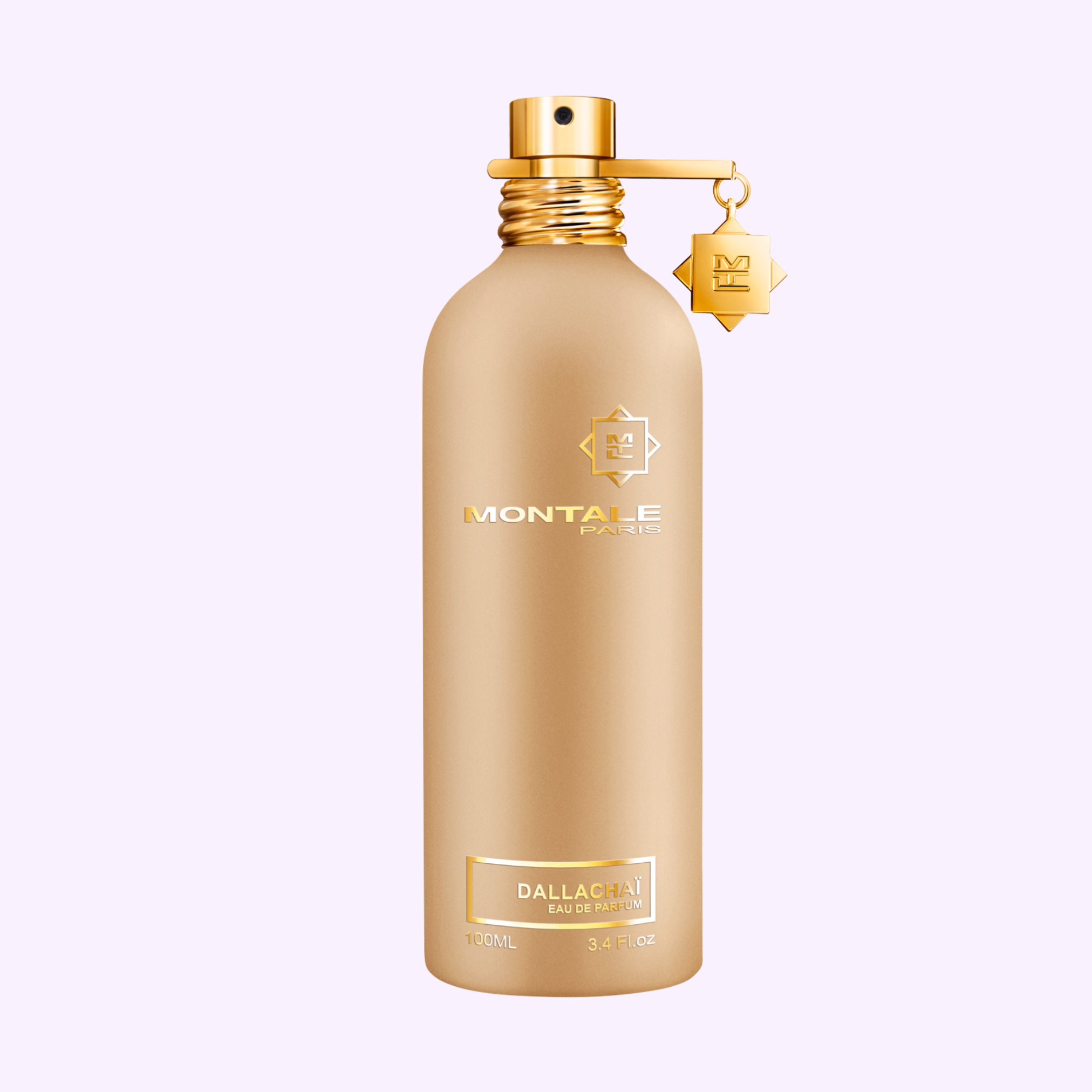 A gold Montale Perfumes bottle with metallic finish, gold cap, and tag. The label reads MONTALE Dallachaï EDP 3.4 Oz. This cardamom scent offers an Arabian coffee aroma, displayed on a light lavender background.
