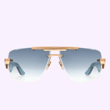 Maybach Sunglasses THE PRESIDENT II PA-WEV-M10, by Maybach Sunglasses, showcase gold frames with blue gradient lenses, double nose pads, and thick arms. Displayed front-facing on a light purple background, these sunglasses embody luxury and sophistication inspired by the iconic THE PRESIDENT II collection.
