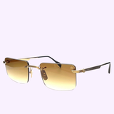 Maybach Optical’s THE WOLF I MG-AB-M09 sunglasses feature a gold-rimmed rectangular frame, gradient brown lenses, black temple tips, and a slim lightweight design—elegantly showcased against a simple light background.