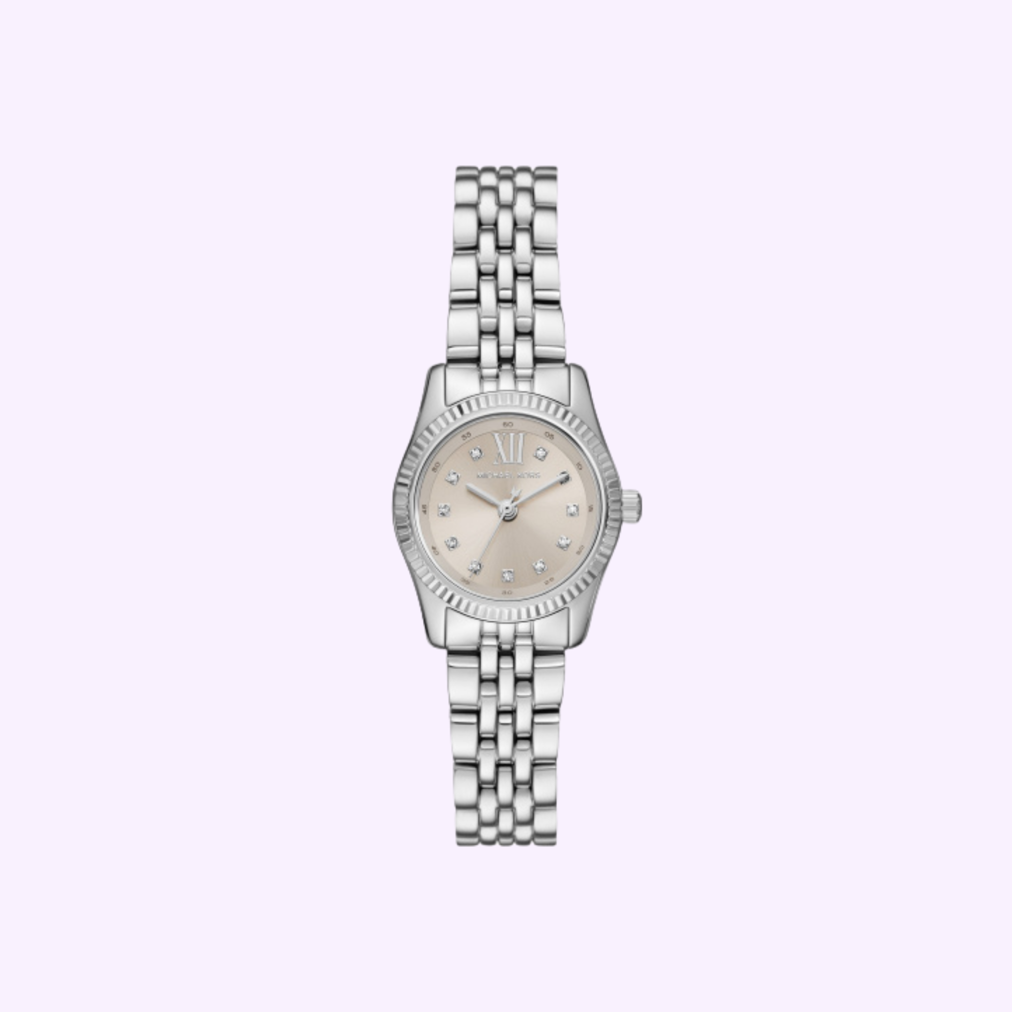 The Michael Kors Watches MK4843 features a silver metal link band, round face, light dial with crystal markers and three hands, elegantly set against a pale purple background.