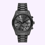 The Michael Kors Watches MK9154 is a black stainless steel wristwatch with a chronograph dial, three subdials, Roman numerals, and a date window, displayed on a light lavender background.