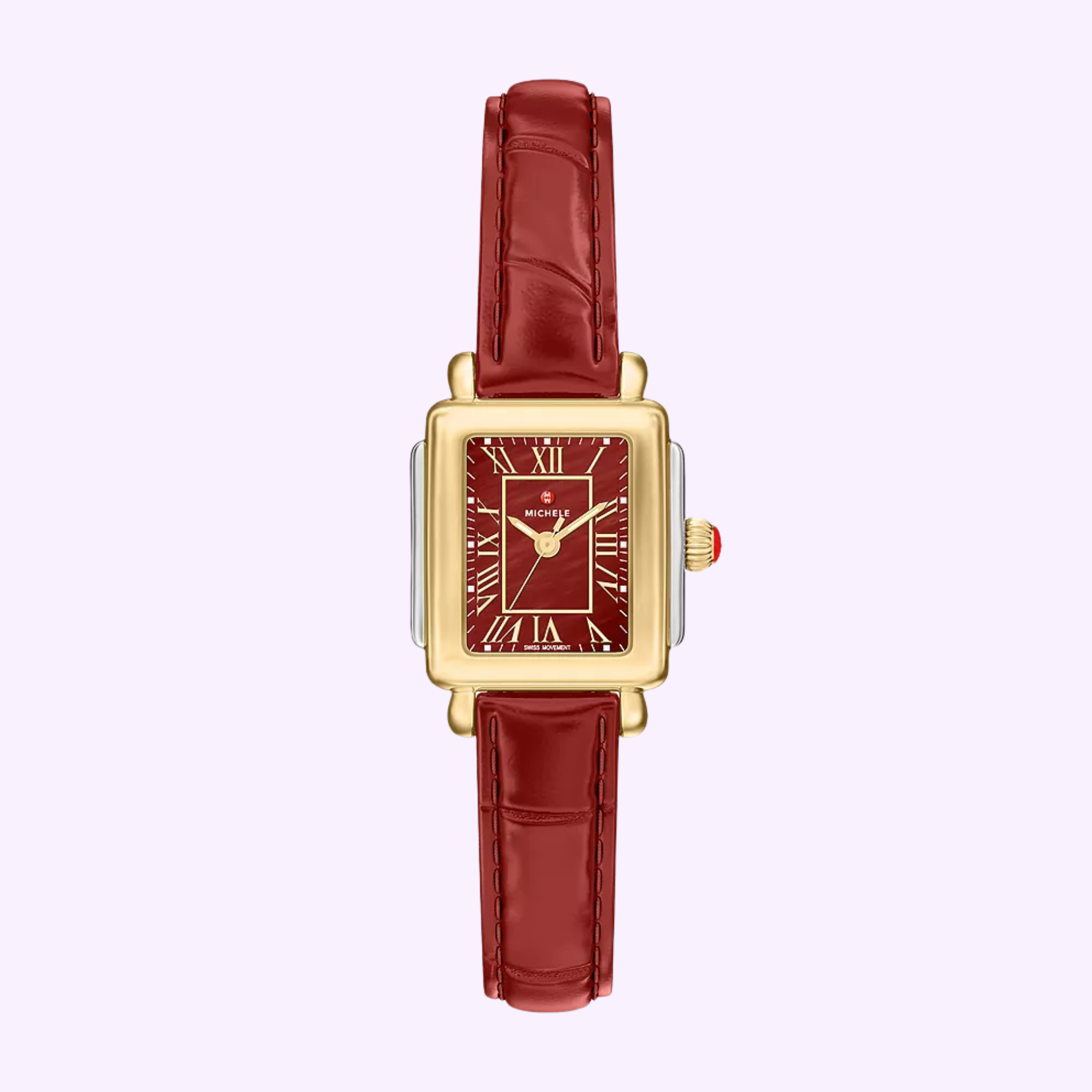 A Michele Watches Deco Madison Mini MWW06D000181 rectangular wristwatch by Michele Watches, featuring a gold and silver case, a ruby red leather strap, and a red face with Roman numerals, displayed on a light purple background.
