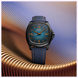 The Mido Watches Multifort TV Big Date M0495263704100, featuring a blue textured strap, black case, and a blue dial with orange accents, is showcased against a dynamic wavy backdrop in blue, purple, and copper tones.