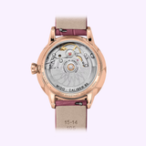 The back view of the Mido Watch Rainflower Night M0432073610600 by Mido Watches shows its automatic movement through a clear case, while the beige and pink leather strap with inner markings highlights its refined style.
