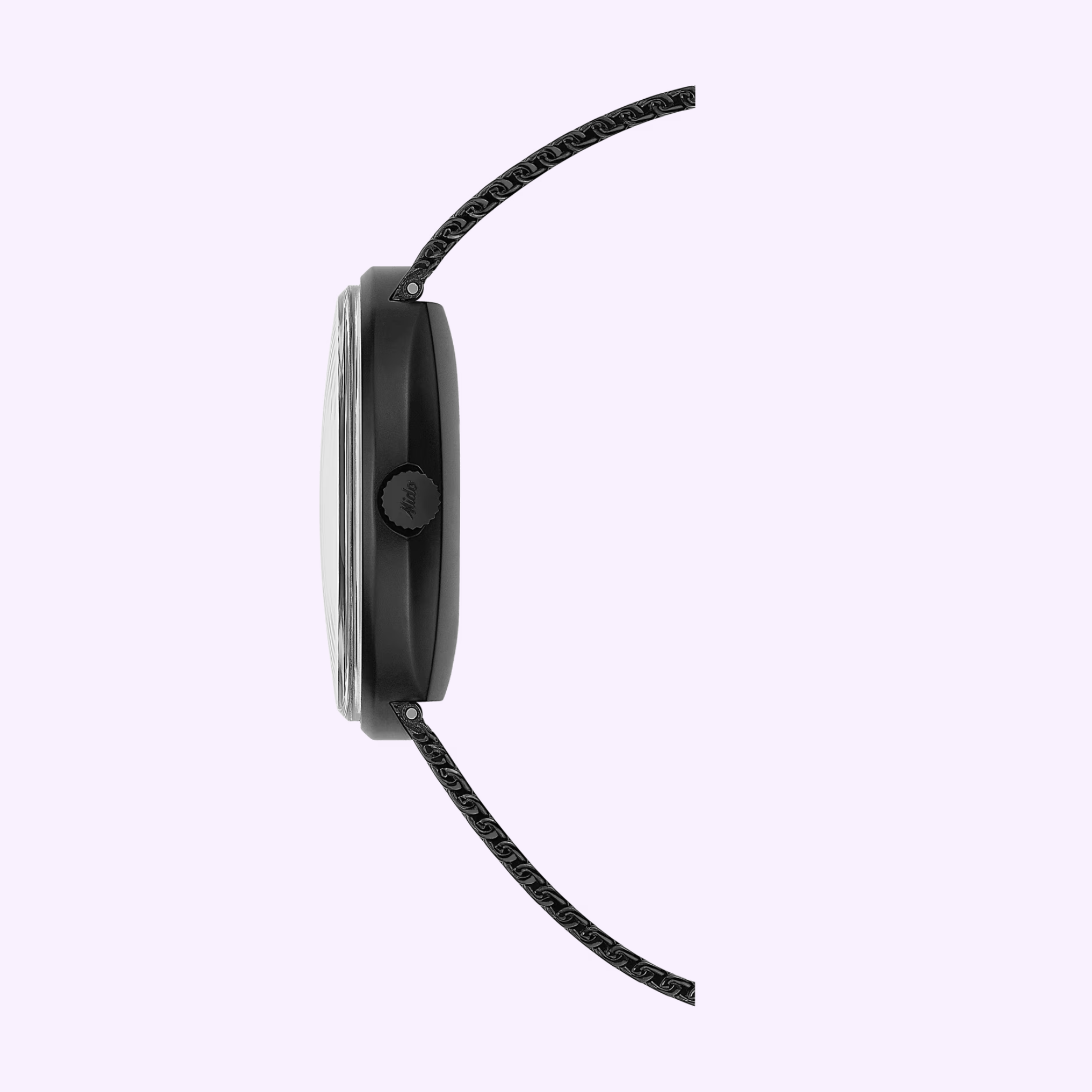 Side view of the Mido Watches Commander Shade M842942511 by Mido Watches, featuring a slim black case, round crown, and black strap. Photographed against a light purple background; automatic movement. The watch face is not visible.