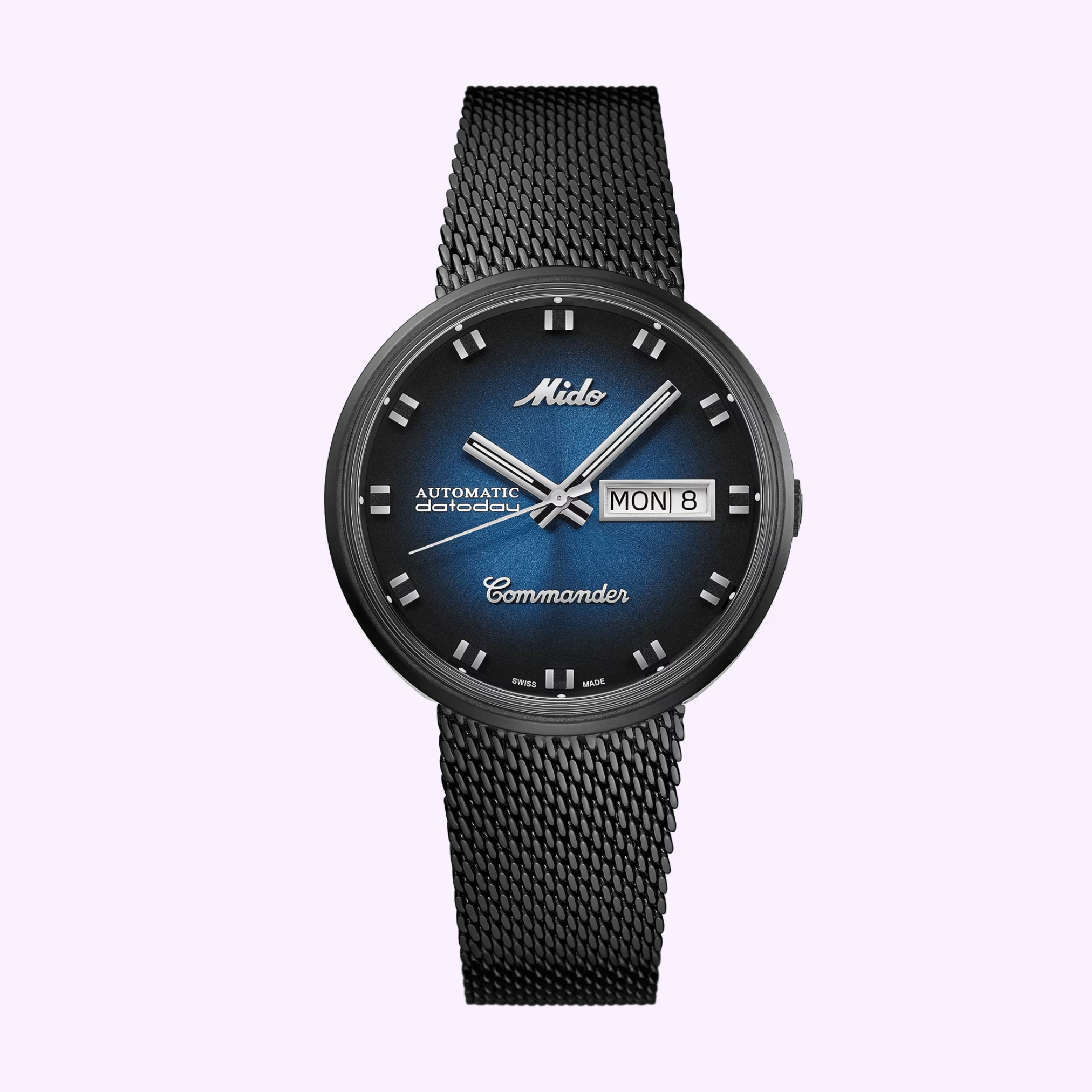 The Mido Watches Commander Shade M842942511 features a black mesh strap, gradient blue dial, silver hour markers and hands, automatic movement, and day-date display on the right side of the dial.
