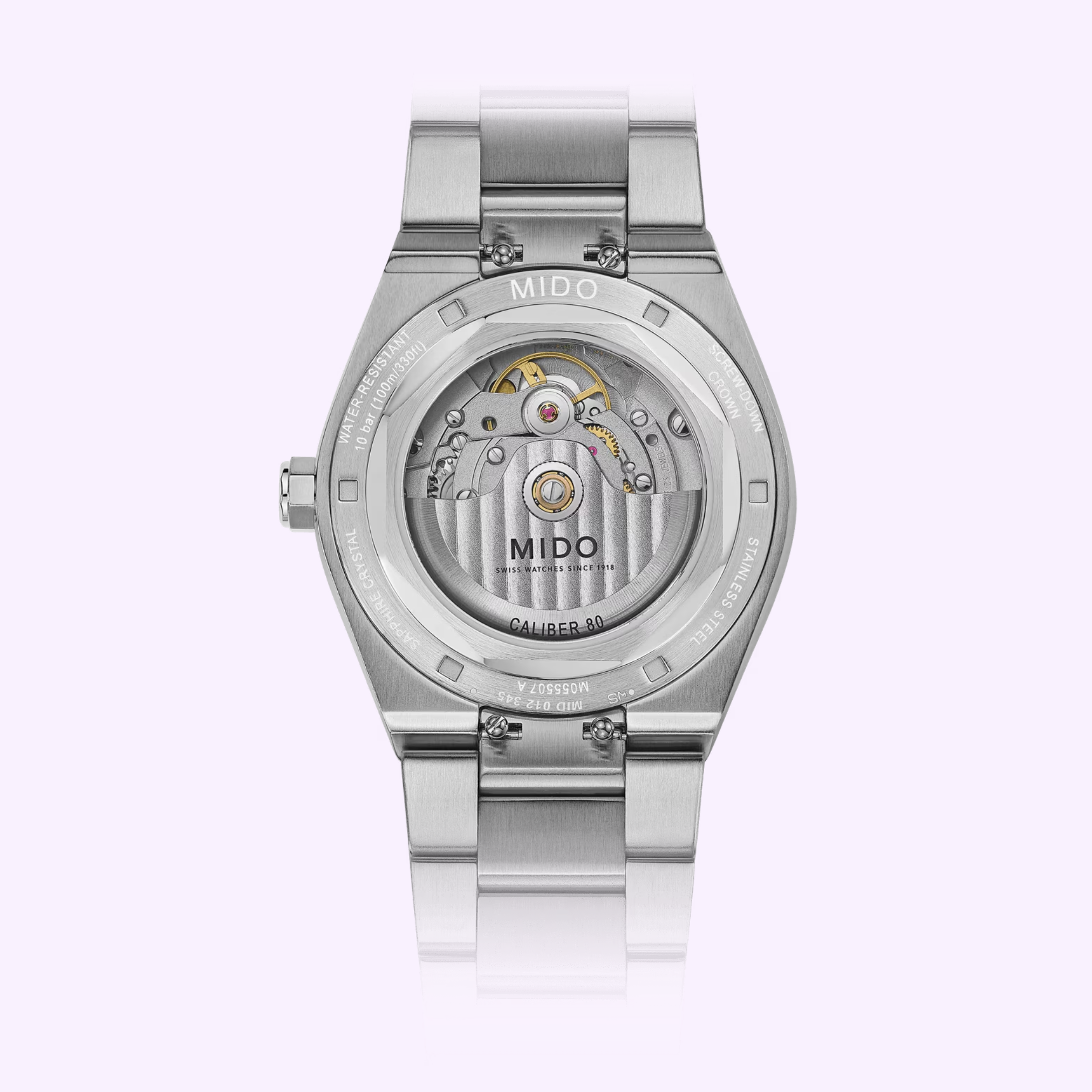 A silver Mido Watches Multifort 8 One Crown M0555071104100 is shown from the back, revealing its transparent case back and visible Swiss automatic movement, with 