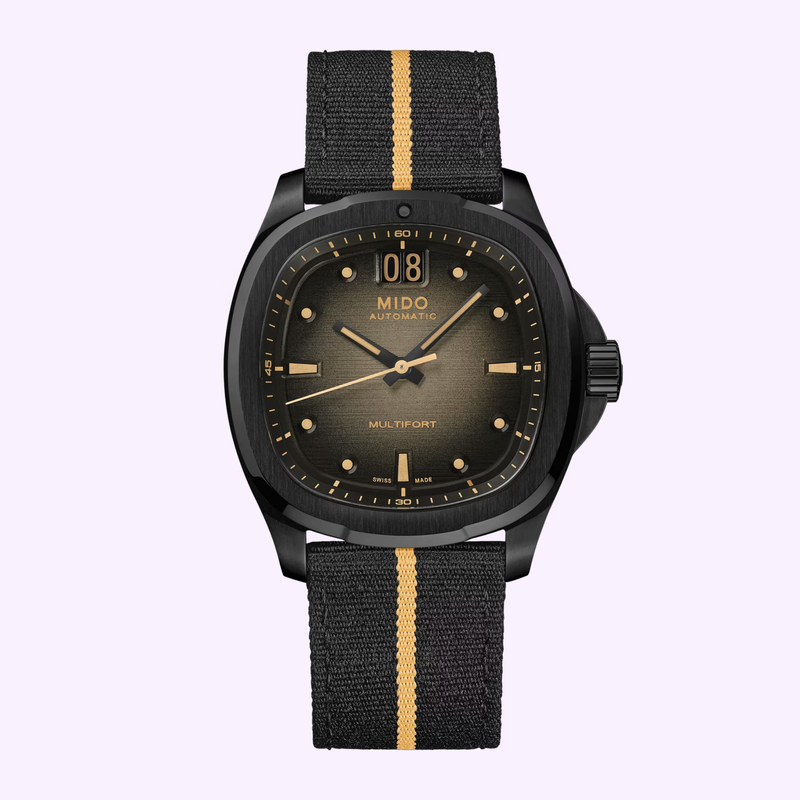 Close-up of the Mido Multifort TV Big Date dial showing the Big Date window at 12 o'clock and gold-toned hands