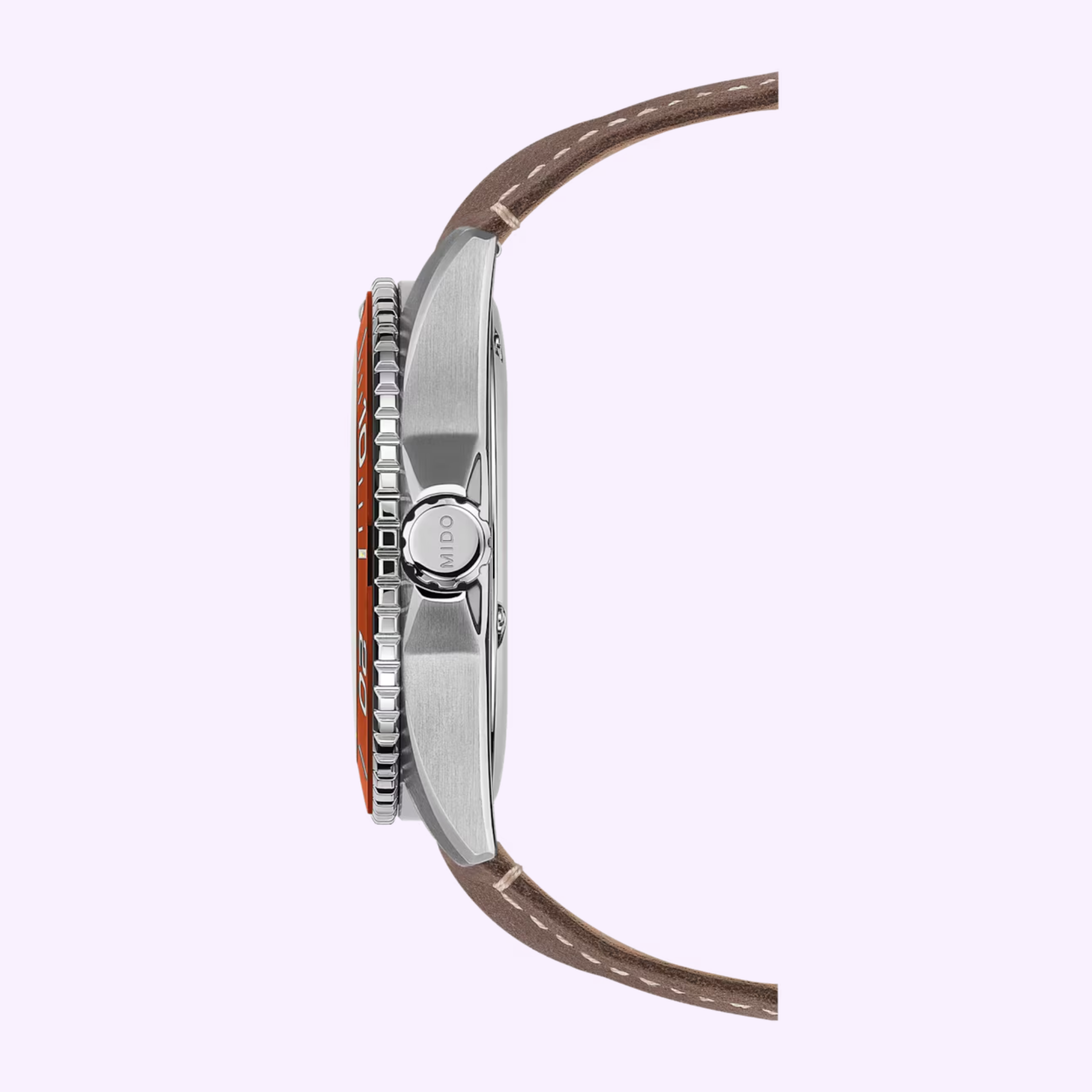 Side view of the Mido Watches Ocean Star 200C M0424301605100 by Mido Watches, featuring a silver case, textured crown, brown leather strap, and red bezel on a light purple background.