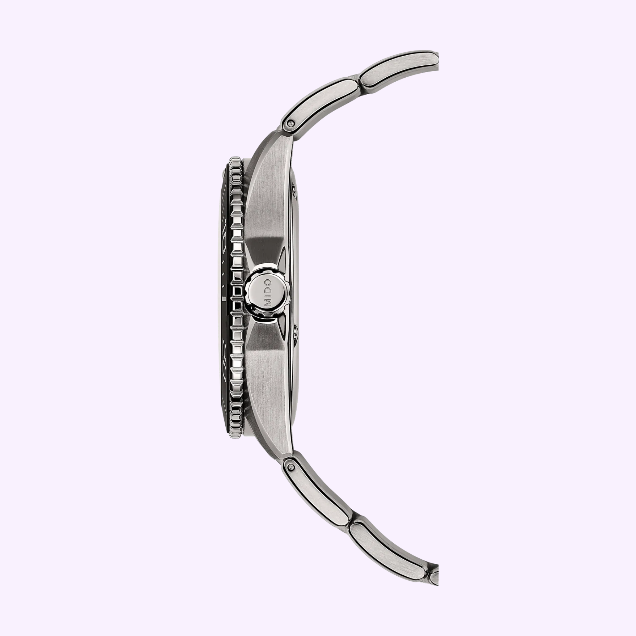Side view of a silver titanium Mido Watches Ocean Star 200C with metal band, round case, textured bezel, and crown engraved with Mido Watches. A refined look inspired by Swiss automatic movement, set against a light purple background.