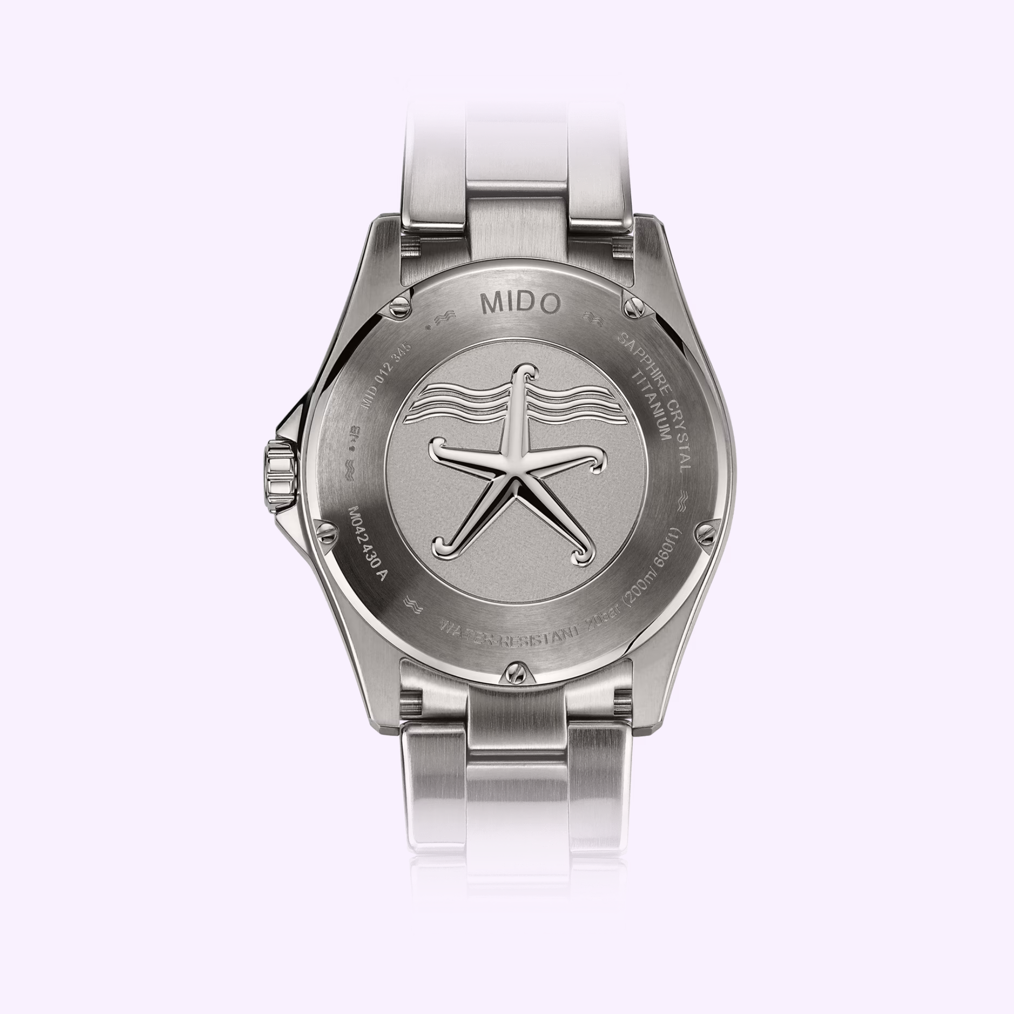 The Mido Watches Ocean Star 200C Titanium (M0424304405100) showcases a brushed metal bracelet and a case back with an engraved starfish and the Mido Watches brand above.