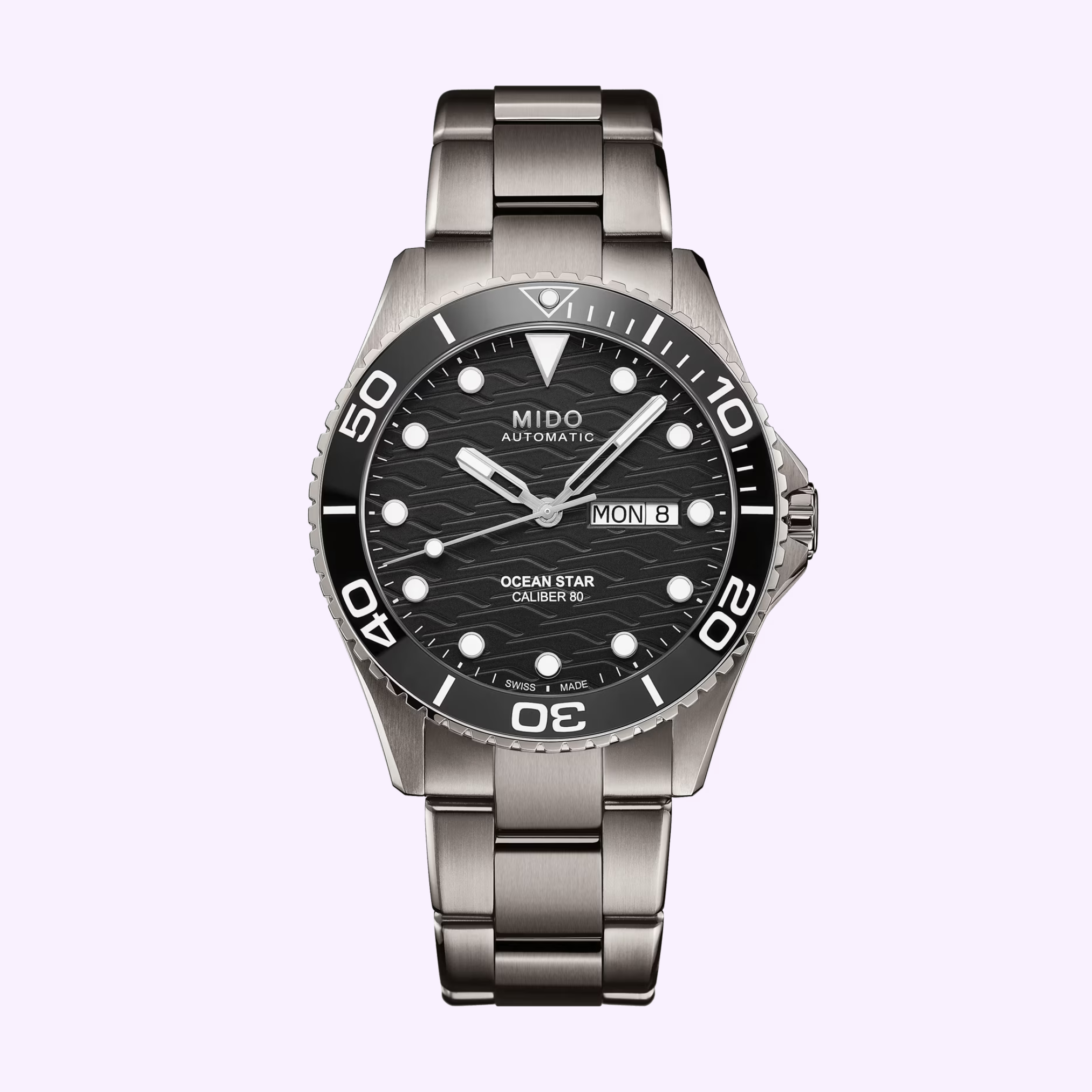 The Mido Watches Ocean Star 200C Titanium M0424304405100 features a titanium case, black wave-patterned dial, automatic Swiss movement, rotating bezel, luminous markers, metal link bracelet, and day-date display at 3 o'clock.