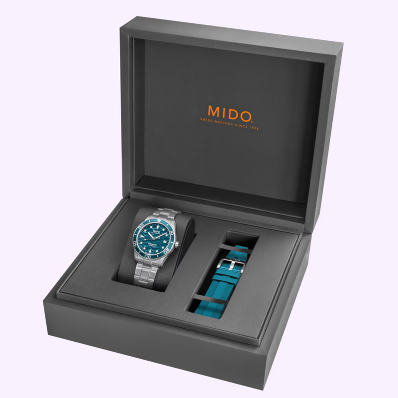 MIDO Ocean Star 39 M0269071104101 displayed in its official Mido presentation box with an extra teal strap