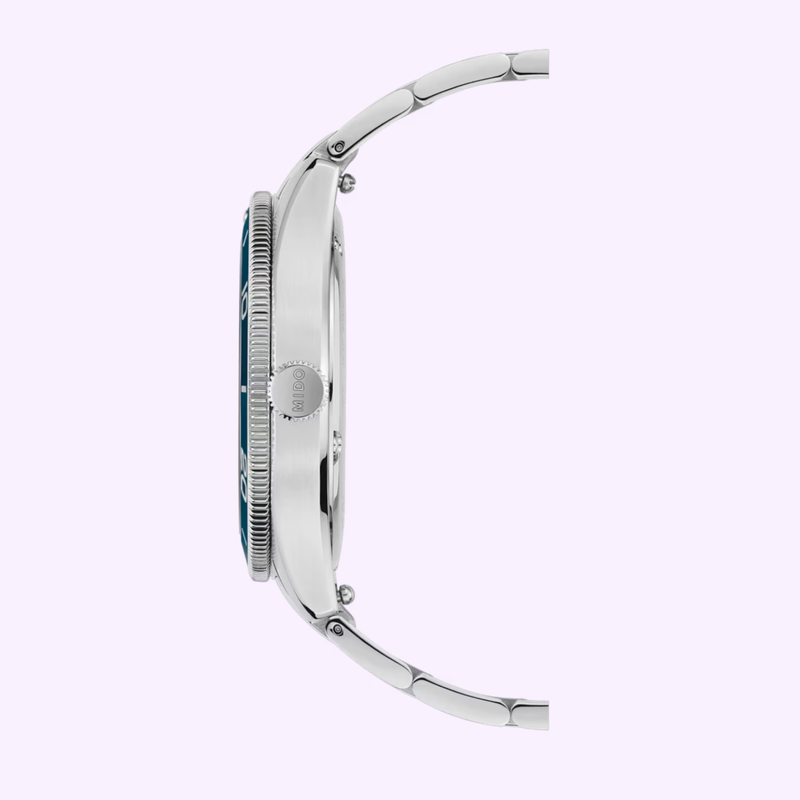 Side view of the Mido Ocean Star 39 showing silver metal link bracelet, round case, and textured bezel