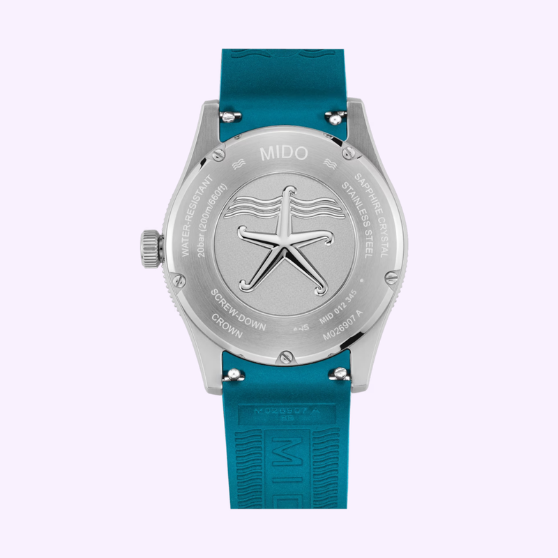 Mido Ocean Star 39 caseback engraved with a starfish design, showing water resistance and material markings