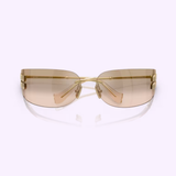 Miu Miu Sunglasses 0MU A51S 5AK20P75 for women (UPC: 8056262412367) feature gold frames with brown gradient lenses, displayed on a light purple background. The temples are adorned with a decorative design near the hinges, making these authentic Miu Miu Sunglasses the perfect statement accessory for any fashion-forward woman.