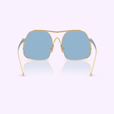 The Miu Miu Sunglasses 0MU A55S 5AK30U57 feature gold frames and blue-tinted lenses, showcased from the front with temples extended and resting on a light purple surface—a stunning piece from Miu Miu Sunglasses that effortlessly combines luxury and modern style.
