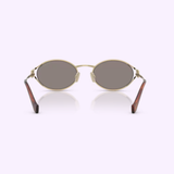 Miu Miu Sunglasses 0MU 52YS ZVN80Q54, featuring oval gold metal frames with brown-tinted lenses and dark brown temples, are displayed facing forward against a light purple background.