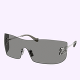 Sleek, rimless Miu Miu sunglasses 0MU B53S 1BC81A44 featuring gray tinted lenses and silver metal arms. The authentic MIU MIU logo appears on the lens edges near the temples, highlighting this distinctive model from Miu Miu Sunglasses.
