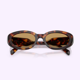 Miu Miu sunglasses 0MU C01S 27L10Y53 by Miu Miu Sunglasses showcase an oval tortoiseshell frame with brown-tinted lenses, shown facing forward on a light background.