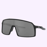 The Oakley OO9406 01 37 Sutro Unisex Sunglasses feature a black, oversized rectangular design with a single Prizm Black lens and Oakley logo on the arm.