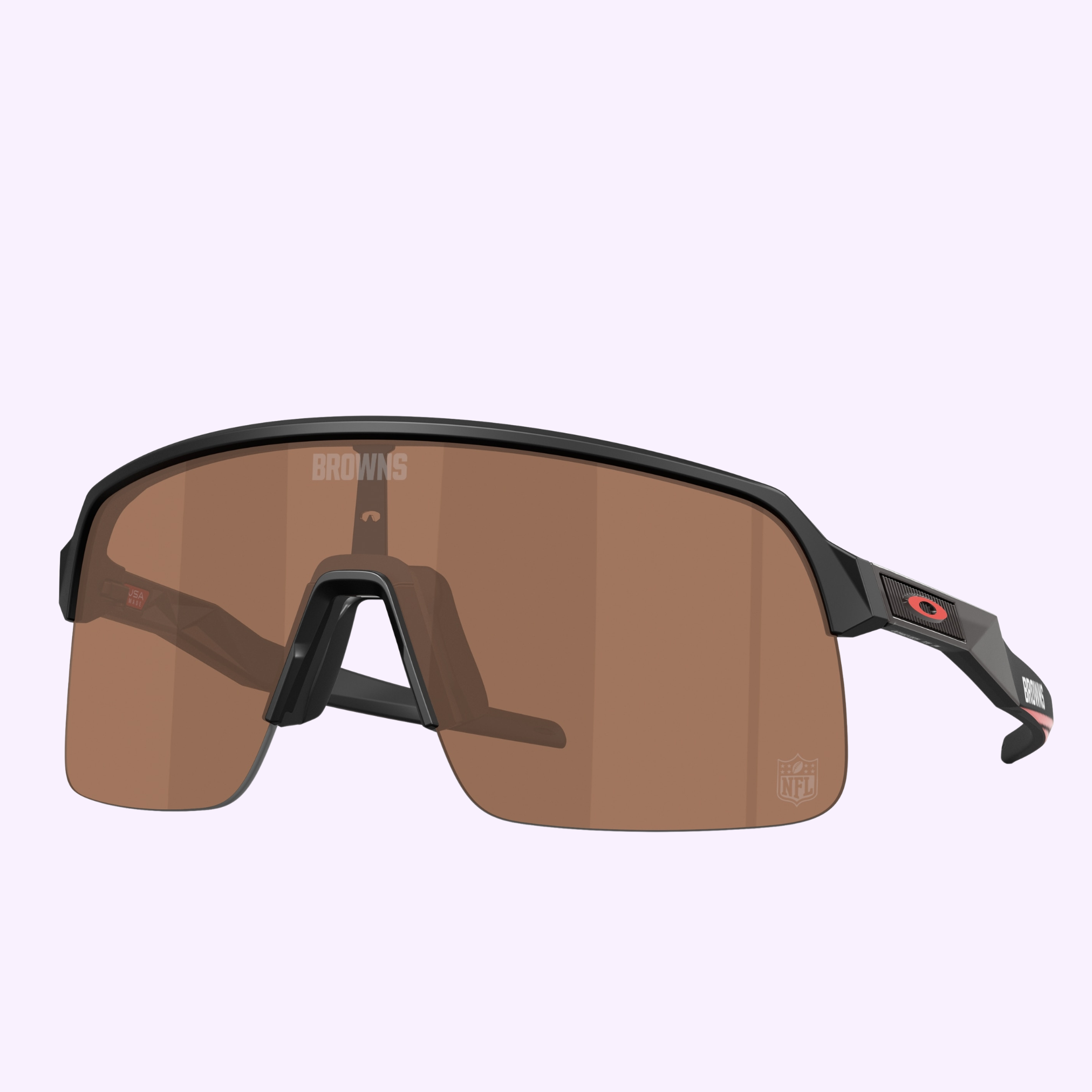 The Oakley Sunglasses 0OO9463 94638839 feature brown-tinted lenses, black frames, a small BROWNS logo above the nose bridge, the NFL logo on the right lens, and an Oakley logo on the temple.