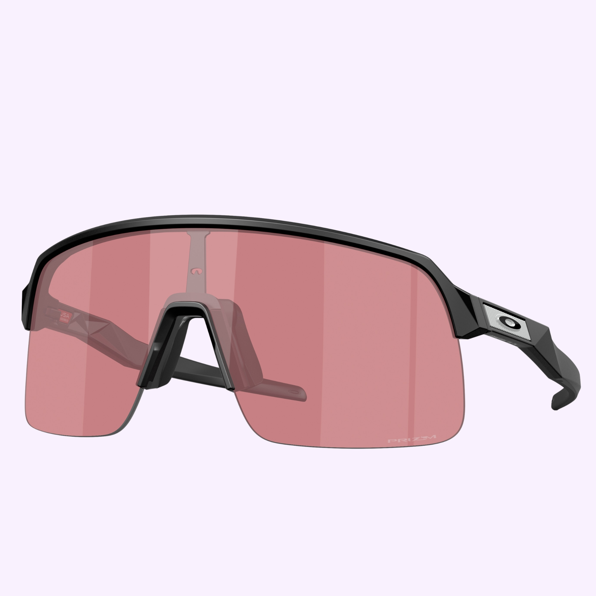 The Oakley Sunglasses 0OO9463 9463B839 feature sporty black frames and large pink-tinted lenses, shown against a light purple background.