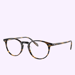 Round tortoiseshell eyeglasses with thin frames and metal hinges, displayed on a light purple background. Featuring a keyhole bridge and clear lenses, these glasses highlight the refined style of the Oliver People Sunglasses OV5004 1003 Optical Frame.