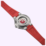 Back of an Oris Watches Aquis Date Relief with a red rubber strap and an exhibition case back revealing the automatic movement and a red rotor.