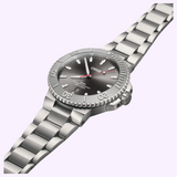 Oris Watches Aquis Date Relief stainless steel wristwatch featuring a grey sunray dial, white luminous markers, a red second hand, a date window at six o’clock, and a rotating dive bezel.