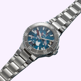 Oris Watches Aquis Date Upcycle Calibre 400 diver’s watch featuring a multicolored recycled PET dial, stainless steel case, and link bracelet.