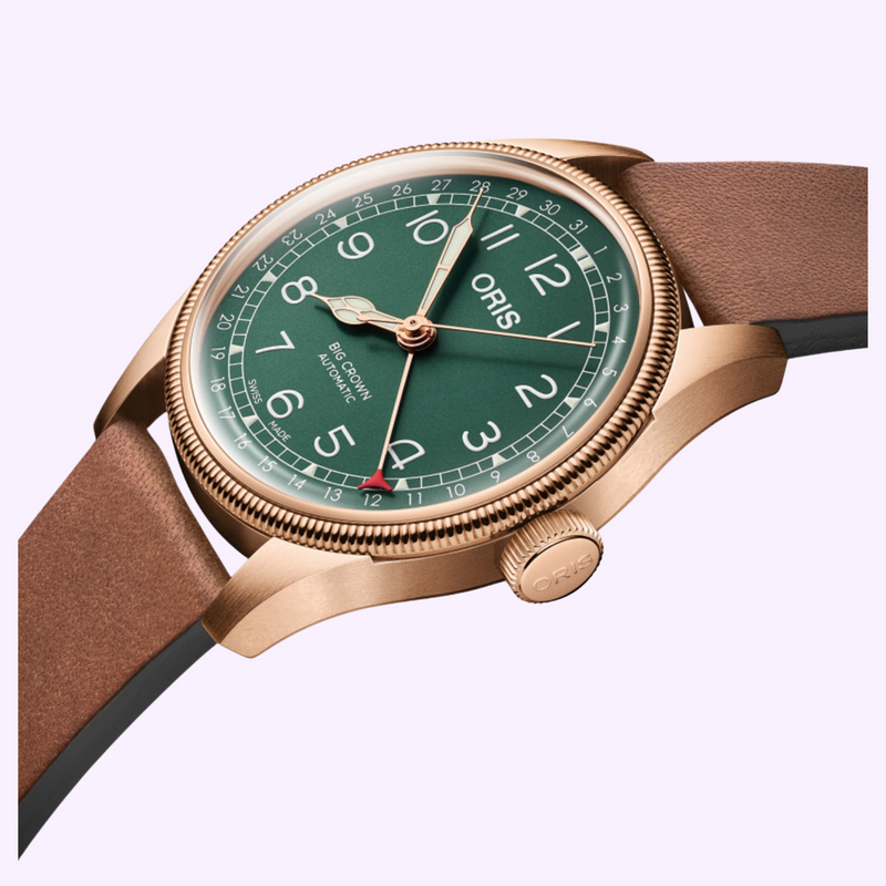 Close-up of the Oris Big Crown Pointer Date anniversary edition green dial and bronze fluted bezel