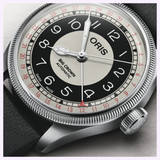 Oris Watches Big Crown Pointer Date Bullseye watch featuring a black and cream bullseye dial, a date pointer hand with a red tip, and a coin-edged bezel on a black strap.
