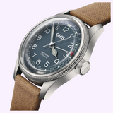 Oris Watches Big Crown Pointer Date with a blue dial, white numerals, a pointer date hand with a red tip, and a tan leather strap.