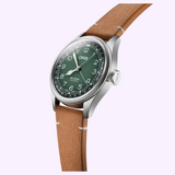 Oris Watches Big Crown X Cervo Volante wristwatch with a green dial, white numerals, a date hand, and a tan leather strap.