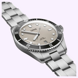 Stainless steel Oris Watches Divers Date with a light gray face, black bezel, and a link bracelet.