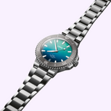 Oris Watches Great Barrier Reef Limited Edition IV diver’s watch with a metal link bracelet and a gradient blue-to-green dial featuring silver indices.