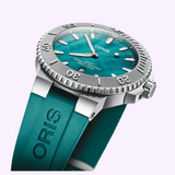 Oris Watches New York Harbor Limited Edition II dive watch featuring a teal mother-of-pearl dial, a rotating gray bezel, and a matching teal rubber strap.
