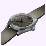 Oris Watches ProPilot Date analog wristwatch featuring a textured dark gray dial, bold Arabic numerals, and a gray leather strap.
