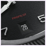 Close-up of an Oris Watches ProPilot Date dial featuring large white numerals, the word PROPILOT in red, and a date window showing 28.